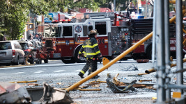 World News: NYC crane catches fire, partially collapses, injuring at least 12