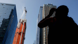 World News: NYC crane catches fire, partially collapses, injuring at least 12