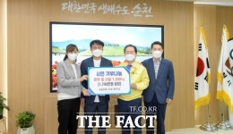 순천시 송림유통 황주성 대표 부부, 축산물로 권분운동 참여