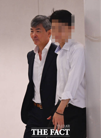 취재진 따돌리며 민중기 특검 출석하는 이종호 [TF사진관]