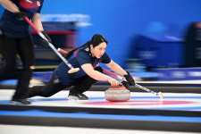 Team Kim drop close-fought game to China