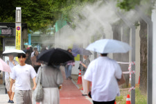 [포토] 물안개 속의 작은 쉼표