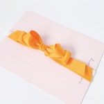 오렌지리본베이비밴드 아기머리띠 돌아기헤어밴드 백일아기머리띠 신생아헤어밴드 아기헤어밴드 : 앙드레뿌띠