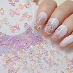 누아식 혼합 얼음 투명 오로라 나비 매듭 네일 아트 장식 귀여운 나비 매듭 네일 참 3D 오로라 활 소녀 네일 부품 6-8mm 600 개 500 개... 