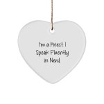 크리스마스를 맞아 남자가 사제에게 준 선물, 명언이 담긴 하트 장식 나는 사제다 나는 너드어로 유창하게 말한다 : 더케이NY
