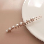 제이로렌 진주 큐빅 로즈골드 일자라인 헤어핀 H0781