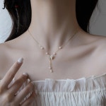 어디에나 잘 어울리는 나비 지퍼 진주 목걸이 여 여름 가벼운 럭셔리 프리미엄 디자인 초커 체인 체인