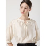 씨씨콜렉트 볼륨 셔링 리본 블라우스 C252MSC032