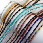 비즈아이 원석라운드 원석불투명 1줄 약38cm 50-004