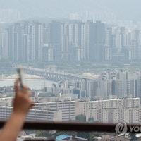 서울 아파트값 22주 연속 올라…상승폭은 축소