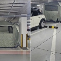 아파트 주차장에 대형 텐트 치고 모기향까지..
