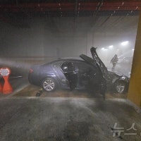부산 아파트 지하 주차장서 주차된 BMW 차량 불…인명피해 없어