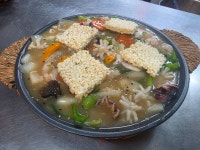 초마면관
