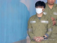 법정 향하는 드루킹 공범 '솔본아르타'