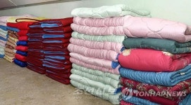 준영이불공장 | 북한, 자투리천으로 이불 생산