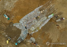 매립지중기모터스 | 수도권매립지 폐기물 매립 작업