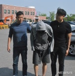 수갑 풀고 도주한 특수폭행 피의자 칠곡경찰서 압송