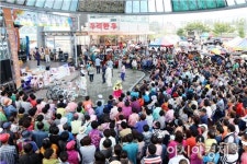 장흥축협토요시장판매장 | 개장 11주년 장흥토요시장의 興!, 빗속을 달구다.