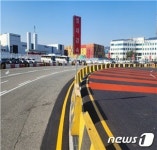 거제제일고 정문 진출입로 개선공사-1 | 부산항 신항 1·2부두 동측 차량 진입로 도로개선공사 완료