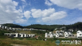 군위군, 마사지구 전원마을 완공