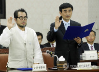 <2010 국감> 증인으로 출석한 민홍규, 김윤배