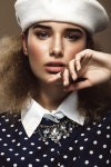 Beautiful girl with classic make-up and hairstyle art, clothing retro style. Beauty face