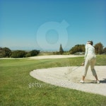Golfer taking a shot from a sand bunker 이미지 (skd261288sdc) - 게티이미지뱅크 Golfer taking a shot from a sand bunker