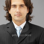 Front view portrait of businessman smiling 이미지 (skd250008sdc) - 게티이미지뱅크 Front view portrait of businessman smiling
