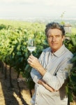side profile of a mature man holding a drink in a vineyard 이미지 (stk305011rkn) - 게티이미지뱅크 side profile of a mature... 