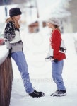 Mother and daughter (13-14) standing with ice skates on bridge in snow 이미지 (200269329-001) - 게티이미지뱅크 Mother and... 