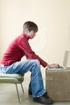 Profile of a young woman using a laptop 이미지 (bldcb0406cwh_0006) - 게티이미지뱅크 Profile of a young woman using a laptop