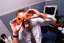 Businessman holding donuts like eyeglasses 이미지 (78034353) - 게티이미지뱅크 Businessman holding donuts like eyeglasses