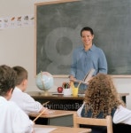 Female teacher teaching a class of children 이미지 (blddb_a0075) - 게티이미지뱅크 Female teacher teaching a class of children