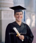 Young female graduate standing outdoors holding a diploma smiling 이미지 (blddb_a0104) - 게티이미지뱅크 Young female... 
