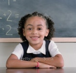 Young girl sitting looking at camera smiling 이미지 (blddb_a0067) - 게티이미지뱅크 Young girl sitting looking at camera smiling