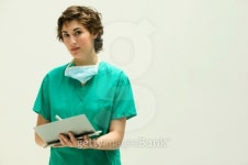 Female doctor writing in a clipboard 이미지 (bldjf_694bldx3-0116) - 게티이미지뱅크 Female doctor writing in a clipboard