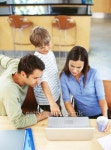 high angle view of parents and their son in front of a laptop 이미지 (stk326008rkn) - 게티이미지뱅크 high angle view of... 