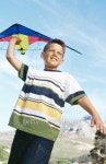 low angle view of a boy playing with a kite 이미지 (stk320002rkn) - 게티이미지뱅크 low angle view of a boy playing with a kite