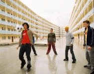 Group of young men playing football in a building complex 이미지 (57600041) - 게티이미지뱅크 Group of young men playing... 