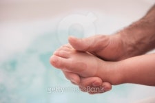 Man holding young childs foot 이미지 (71417860) - 게티이미지뱅크 Man holding young childs foot