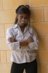 Smiling Young Female Student Against Brick Wall 이미지 (90390705) - 게티이미지뱅크 Smiling Young Female Student Against Brick... 