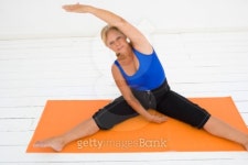 Woman stretching on exercise mat 이미지 (78650360) - 게티이미지뱅크 Woman stretching on exercise mat