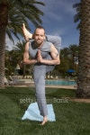 Man doing yoga position at poolside 이미지 (75461767) - 게티이미지뱅크 Man doing yoga position at poolside