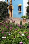 Spanish house in pueblo with blue walls and yellow 이미지 (99217716) - 게티이미지뱅크 Spanish house in pueblo with blue walls... 
