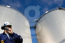 refinery oil tanks and engineer 이미지 (144799324) - 게티이미지뱅크 refinery oil tanks and engineer