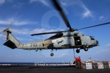 SH-60B helicopter on the flight deck of USS Kitty Hawk during a... SH-60B helicopter on the flight deck of USS Kitty Hawk during a... 