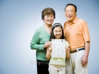 Asian grandparents and granddaughter with school paper 이미지 (79383699) - 게티이미지뱅크 Asian grandparents and... 