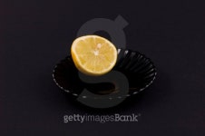 Half of lemon on the saucer 이미지 (90369424) - 게티이미지뱅크 Half of lemon on the saucer
