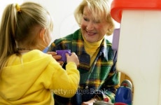 Grandma and granddaughter playing in toy kitchen 이미지 (128959189) - 게티이미지뱅크 Grandma and granddaughter playing in toy... 