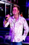 Man at a nightclub singing karaoke 이미지 (128940275) - 게티이미지뱅크 Man at a nightclub singing karaoke